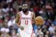 Feb 27, 2013; Houston, TX, USA; Houston Rockets shooting guard James Harden (13) dribbles up court against the Milwaukee Bucks during the second half at the Toyota Center. The Bucks won 110-107. Mandatory Credit: Thomas Campbell-USA TODAY Sports