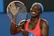Sloane Stephens of the U.S. celebrates after winning her second round match against Ajla Tomljanovic of Croatia at the Australian Open tennis championship in Melbourne, Australia, Thursday, Jan. 16, 2014.(AP Photo/Eugene Hoshiko)