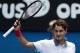 Roger Federer of Switzerland celebrates his win over Teymuraz Gabashvili of Russia during their third round match at the Australian Open tennis championship in Melbourne, Australia, Saturday, Jan. 18, 2014.(AP Photo/Aaron Favila)