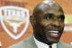 Charlie Strong answers questions during an NCAA college football news conference where he was introduced as the new Texas football coach, Monday, Jan. 6, 2014, in Austin, Texas. Strong acknowledged the historical significance of being the school's first African-American head coach of a men's sport. He takes over for Mack Brown, who stepped down last month after 16 seasons. (AP Photo/Eric Gay)