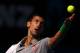 MELBOURNE, AUSTRALIA - JANUARY 19: Novak Djokovic of Serbia serves in his fourth round match against Fabio Fognini of Italy during day seven of the 2014 Australian Open at Melbourne Park on January 19, 2014 in Melbourne, Australia. (Photo by Michael Dodge/Getty Images)