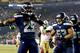 SEATTLE, WA - JANUARY 19: Cornerback Richard Sherman #25 of the Seattle Seahawks celebrates after he tips the ball leading to an intereption by outside linebacker Malcolm Smith #53 to clinch the victory for the Seahawks against the San Francisco 49ers during the 2014 NFC Championship at CenturyLink Field on January 19, 2014 in Seattle, Washington. (Photo by Jonathan Ferrey/Getty Images)