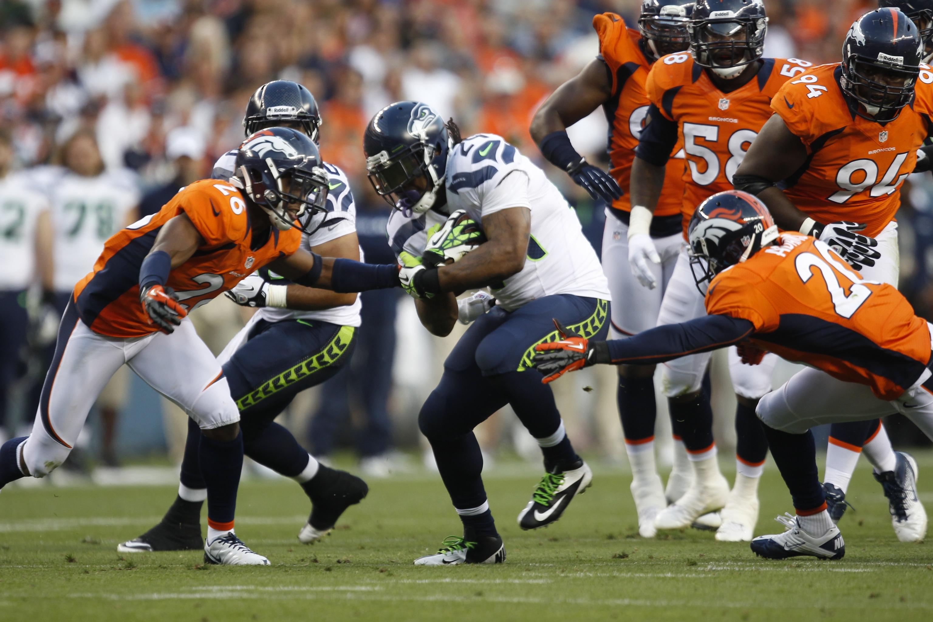 Seattle Seahawks running back Marshawn Lynch (24) rushes for no gain as he  is down on the Denver 1 yard line at the Super Bowl XLVIII at MetLife  Stadium in East Rutherford