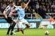 NEWCASTLE, UNITED KINGDOM - OCTOBER 30: Jack Rodwell (R) of Manchester City goes down under a challenge from Mike Williamson of Newcastle United during the Capital One Cup Fourth Round match between Newcastle United and Manchester City at St James' Park on October 30, 2013 in Newcastle upon Tyne, England (Photo by Ian Horrocks/Getty Images)