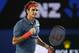 MELBOURNE, AUSTRALIA - JANUARY 20: Roger Federer of Switzerland celebrates a point in his fourth round match against Jo-Wilfried Tsonga of France during day eight of the 2014 Australian Open at Melbourne Park on January 20, 2014 in Melbourne, Australia. (Photo by Clive Brunskill/Getty Images)