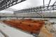 Workers flatten the soil for the pitch in the Arena de Baixada in Curitiba, Brazil, Wednesday, Dec. 11, 2013. Four matches of the 2014 soccer World Cup will be played in the stadium. (AP Photo/Ferdinand Ostrop)