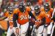 Dec 8, 2013; Denver, CO, USA; Denver Broncos defensive tackle Terrance Knighton (94) after catching an interception during the second half against the Tennessee Titans at Sports Authority Field at Mile High. The Broncos won 51-28. Mandatory Credit: Chris Humphreys-USA TODAY Sports