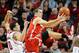 LINCOLN, NE - JANUARY 20: Aaron Craft #4 of the Ohio State Buckeyes grabs a rebound over Tai Webster #0 of the Nebraska Cornhuskers during a game at Pinnacle Bank Arena on January 20, 2014 in Lincoln, Nebraska. (Photo by Eric Francis/Getty Images)