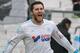 Marseille's French forward Andre-Pierre Gignac, right, reacts after scoring against Bordeaux, during their League One soccer match, at the Velodrome Stadium, in Marseille, southern France, Sunday, Dec. 22, 2013. (AP Photo/Claude Paris)