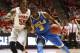 UCLA's Jordan Adams, right, is cut off by Utah's Delon Wright during the second half of an NCAA college basketball game in Salt Lake City, Saturday, Jan. 18, 2014. Utah defeated UCLA 74-69. (AP Photo/George Frey)