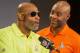 Pro Football Hall of Famer Jerry Rice, right, reacts to comments made by fellow Hall of Famer Deion Sanders during a news conference for the NFL Pro Bowl Draft, Tuesday, Jan. 21, 2014, Kapolei, Hawaii. (AP Photo/Marco Garcia)