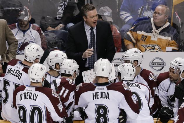 Colorado Avalanche coach Patrick Roy talks with his players during a timeout in the third period of an NHL hockey game against the Nashville Predators on Saturday, Jan. 18, 2014, in Nashville, Tenn. The Avalanche won 5-4. (AP Photo/Mark Humphrey)