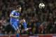 Chelsea's Juan Mata chips a pass to a teammate during their English League Cup soccer match between Arsenal and Chelsea at the Emirates stadium in London Tuesday, Oct. 29, 2013. (AP Photo/Alastair Grant)