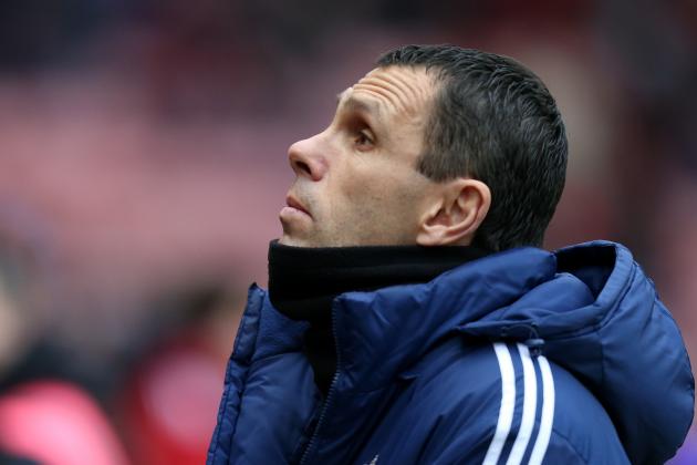 Sunderland's manager Gus Poyet looks on ahead of their English Premier League soccer match against Southampton at the Stadium of Light, Sunderland, England, Saturday, Jan. 18, 2014. (AP Photo/Scott Heppell)