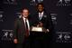 NEW YORK, NY - DECEMBER 14: Jameis Winston, quarterback of the Florida State Seminoles, poses with Head coach Jimbo Fisher and the trophy during a press conference after the 2013 Heisman Trophy Presentation at the Marriott Marquis on December 14, 2013 in New York City. (Photo by Jeff Zelevansky/Getty Images)