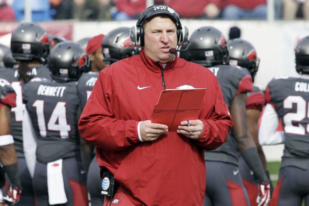FILE - In this Nov. 23, 2013, file photo, Arkansas coach Bret Bielema walks onto the field in the first half of an NCAA college football game against Mississippi State in Little Rock, Ark. After a 3-9 season, the worst in school history, Bielema has seen the SEC West up close and personal, but he's not about to lower where he thinks the Razorbacks are headed. (AP Photo/Danny Johnston, File)