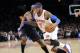 New York Knicks' Carmelo Anthony, right, drives by Charlotte Bobcats' Anthony Tolliver during the second quarter of an NBA basketball game, Friday, Jan. 24, 2014, at Madison Square Garden in New York. (AP Photo/Bill Kostroun)