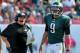 TAMPA, FL - OCTOBER 13: Quarterback Nick Foles #9 of the Philadelphia Eagles talks with coach Chip Kelly as time runs down in the 4th quarter against the Tampa Bay Buccaneers October 13, 2013 at Raymond James Stadium in Tampa, Florida. The Eagles won 31 - 20. (Photo by Al Messerschmidt/Getty Images)