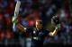 AUCKLAND, NEW ZEALAND - JANUARY 25: Martin Guptill of New Zealand celebrates his century during the One Day International match between New Zealand and India at Eden Park on January 25, 2014 in Auckland, New Zealand. (Photo by Anthony Au-Yeung/Getty Images)
