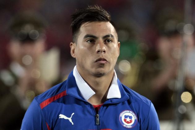 Chile's Eduardo Vargas stands on the field during a ceremony before the start of a 2014 World Cup qualifying soccer match against Ecuador in Santiago, Chile, Tuesday, Oct. 15, 2013. (AP Photo/Luis Hidalgo)