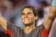MELBOURNE, AUSTRALIA - JANUARY 24: Rafael Nadal of Spain celebrates winning his semifinal match against Roger Federer of Switzerland during day 12 of the 2014 Australian Open at Melbourne Park on January 24, 2014 in Melbourne, Australia. (Photo by Quinn Rooney/Getty Images)
