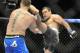Jan 25, 2014; Chicago, IL, USA; Stipe Miocic (red gloves) fights Gabriel Gonzaga (blue gloves) during UFC on FOX 10 at the United Center. Mandatory Credit: David Banks-USA TODAY Sports