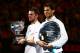 MELBOURNE, AUSTRALIA - JANUARY 26: Stanislas Wawrinka of Switzerland holds the Norman Brookes Challenge Cup after winning, and Rafael Nadal of Spain holds the runner up plate after their men's final match during day 14 of the 2014 Australian Open at Melbourne Park on January 26, 2014 in Melbourne, Australia. (Photo by Matt King/Getty Images)