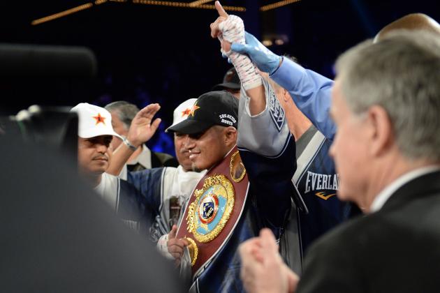 Jan 25, 2014; New York, NY, USA; Mikey Garcia celebrates his win over Juan Carlos Burgos (not pictured) after their WBO junior lightweight title bout at The Theater at Madison Square Garden. Garcia won via unanimous decision. Mandatory Credit: Joe Camporeale-USA TODAY Sports
