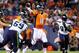 Aug 18, 2012; Denver, CO, USA; Denver Broncos quarterback Peyton Manning (18) passes in the second quarter against the Seattle Seahawks at Sports Authority Field. Mandatory Credit: Byron Hetzler-USA TODAY Sports