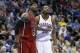 Miami Heat forward LeBron James (6) and Oklahoma City Thunder forward Kevin Durant (35) watch a foul shot during the third quarter of an NBA basketball game in Oklahoma City, Thursday, Feb. 14, 2013. Miami won 110-100. (AP Photo/Sue Ogrocki)