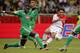Kurt Zouma challenges Monaco's Radamel Falcao.