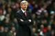 LONDON, ENGLAND - JANUARY 04: Arsene Wenger the Arsenal manager looks on during the Budweiser FA Cup match between Arsenal and Tottenham Hotspur at Emirates Stadium on January 4, 2014 in London, England. (Photo by Clive Rose/Getty Images)