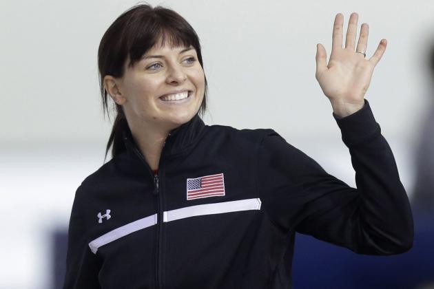 Heather Richardson waves to the crowd following her win in the women's 1,500 meters during the U.S. Olympic speedskating trials Tuesday, Dec. 31, 2013, in Kearns, Utah. (AP Photo/Rick Bowmer)