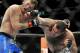 Stipe Miocic left, fights Gabriel Gonzaga right, during the heavyweight bout of a UFC mixed martial arts match in Chicago, Saturday, Jan. 25, 2014. (AP Photo/Paul Beaty)
