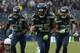 Dec 9, 2012; Seattle, WA, USA; Seattle Seahawks cornerback Richard Sherman (25) is accompanied by safety Kim Chancellor (31) and free safety Earl Thomas (31) on a 19-yard interception return for a touchdown against the Arizona Cardinals at CenturyLink Field. Mandatory Credit: Kirby Lee/Image of Sport-USA TODAY Sports