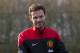 Manchester United's new signing Juan Mata stands before a press conference at the team's Carrington training ground, Manchester, England, Monday, Jan. 27, 2014. With Manchester United in danger of missing out on the Champions League next season, Juan Mata's arrival at Old Trafford for a club record fee of 37.1 million pounds ($61.2 million) is certainly an emergency move. But it also marks the first step in the rebuilding process of England's most titled club. After a botched transfer campaign last summer that was followed by the club's lackluster first half of the season, United now looks determined to allow manager David Moyes the opportunity to build his own team.(AP Photo/Jon Super)