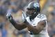 North Carolina defensive end Kareem Martin (95) in action in an NCAA football game between Pittsburgh and North Carolina, Saturday, Nov. 16, 2013 in Pittsburgh. (AP Photo/Keith Srakocic)