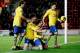Arsenal's Santi Cazorla, third right, celebrates his goal with, from left, Mathieu Flamini, Olivier Giroud and Mesut Ozil during the English Premier League soccer match between Southampton and Arsenal at St Mary's stadium in Southampton, Tuesday, Jan. 28, 2014. (AP Photo/Matt Dunham)