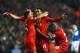 LIVERPOOL, ENGLAND - JANUARY 28: Daniel Sturridge (C) of Liverpool is congratulated by teammates Luis Suarez (2nd L), Raheem Sterling (L) and after scoring his team's third goal Aly Cissokho during the Barclays Premier League match between Liverpool and Everton at Anfield on January 28, 2014 in Liverpool, England. (Photo by Laurence Griffiths/Getty Images)