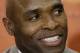 Charlie Strong smiles during a news conference where he is introduced as the new Texas football coach, Monday, Jan. 6, 2014, in Austin, Texas. (AP Photo/Eric Gay)