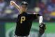 Pittsburgh Pirates starting pitcher A.J. Burnett works against the Texas Rangers in the first inning of a baseball game, Wednesday, Sept. 11, 2013, in Arlington, Texas. (AP Photo/Tony Gutierrez)
