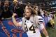 NEW ORLEANS, LA - JANUARY 03: Kicker Brendan Gibbons #34 of the Michigan Wolverines celebrates with fans after Michigan won 23-20 in overtime on Gibbons 37-yard game-winning field goal against the Virginia Tech Hokies during the Allstate Sugar Bowl at Mercedes-Benz Superdome on January 3, 2012 in New Orleans, Louisiana. (Photo by Chris Graythen/Getty Images)