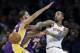 New York Knicks' J.R. Smith, right, passes around Los Angeles Lakers' Kendall Marshall during the second half of an NBA basketball game at Madison Square Garden, Sunday, Jan. 26, 2014, in New York. The Knicks defeated the Lakers 110-103. (AP Photo/Seth Wenig)