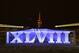 In this photograph taken while zooming out the lens during a long exposure, the Empire State Building, top, backdrops roman numerals for the NFL Super Bowl XLVIII football game at Pier A Park in Hoboken, N.J., Tuesday, Jan. 28, 2014. The Seattle Seahawks and the Denver Broncos are scheduled to play on Sunday, Feb. 2, 2014, at MetLife Stadium in East Rutherford, N.J. (AP Photo/Julio Cortez)