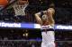 Jan 15, 2014; Washington, DC, USA; Washington Wizards center Marcin Gortat (4) dunks the ball against the Miami Heat in the first quarter at Verizon Center. Mandatory Credit: Geoff Burke-USA TODAY Sports