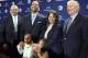 Penn State's new football coach, James Franklin, poses for photos after he was introduced Saturday, Jan. 11, 2014, in State College, Pa. From left in back are Penn State athletic director David Joyner; Franklin; his wife, Fumi Franklin; and Penn State President Rodney Erickson. The Franklins' children, Shola, 6, left, and Addison, 5, are in front. (AP Photo/John Beale)