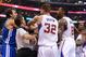 Oct 31, 2013; Los Angeles, CA, USA; NBA referee Mark Ayotte (56) and Los Angeles Clippers power forward Blake Griffin (32) separate center DeAndre Jordan (6) after he was fouled by Golden State Warriors center Andrew Bogut (far left) in the second quarter of the game at Staples Center. Mandatory Credit: Jayne Kamin-Oncea-USA TODAY Sports