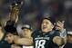 Michigan State quarterback Connor Cook holds the trophy after Michigan State defeated Stanford 24-20 in the Rose Bowl NCAA college football game Wednesday, Jan. 1, 2014, in Pasadena, Calif. (AP Photo/Danny Moloshok)