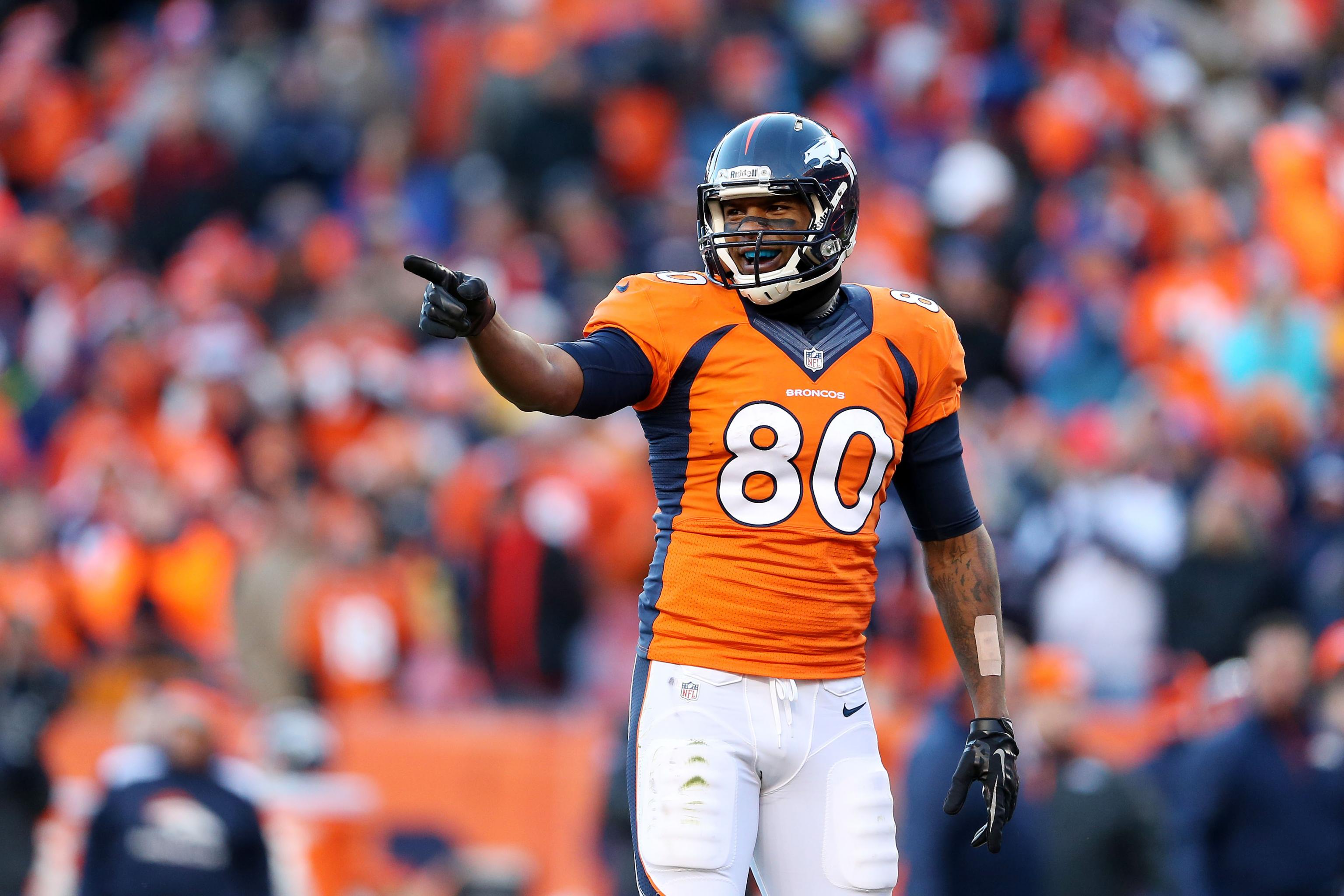 Denver Broncos tight end Julius Thomas (80) watches as the pass