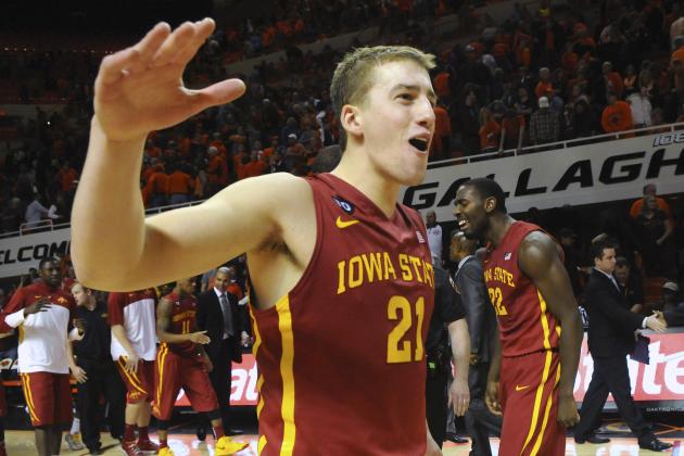 Iowa State center Matt Thomas celebrates with teammates following a triple overtime win in an NCAA college basketball game in Stillwater, Okla., Monday, Feb. 3, 2014. Thomas scored 6 points in Iowa State's 98-97 win. (AP Photo/Brody Schmidt)